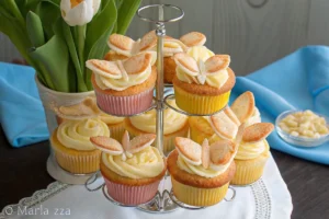 Close up view of freshly made butterfly cake on a white plate