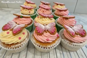 A tray of butterfly cakes shows the baking process, from batter to finished designs